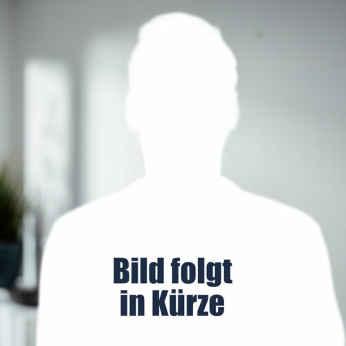 Platzhalter für Mitarbeiterfoto - weißer Umriss einer Person mit Aufschrift "Bild folgt in Kürze"